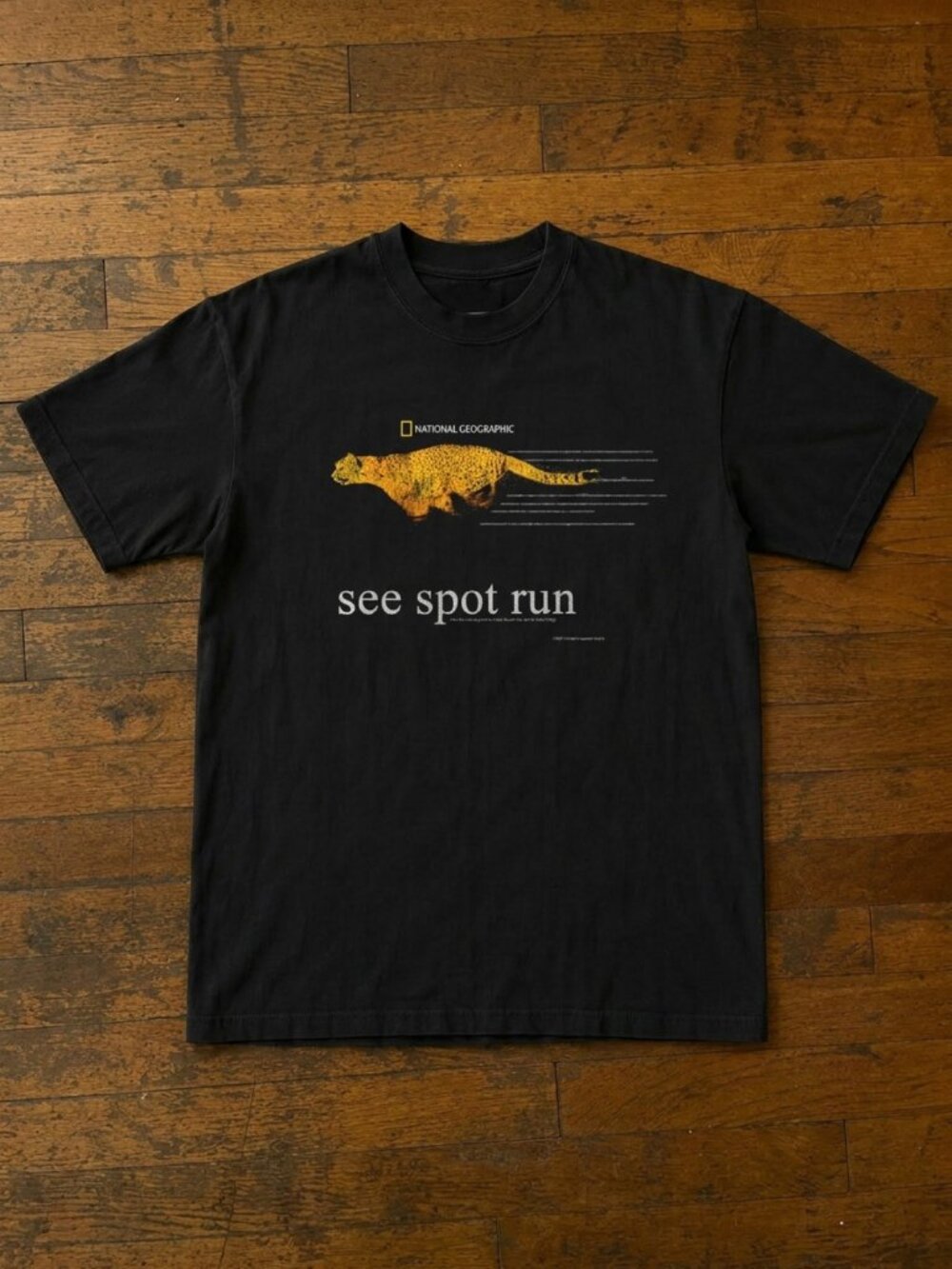 Y2K 'See Spot Run' Cheetah Nat Geo Rare Washed Black T-Shirt